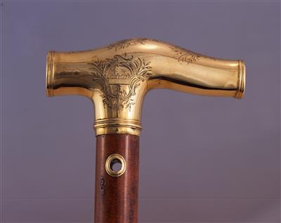 X1042 - gold headed cane, handle detail with arms, left hand side.jpg; X1042; ; 